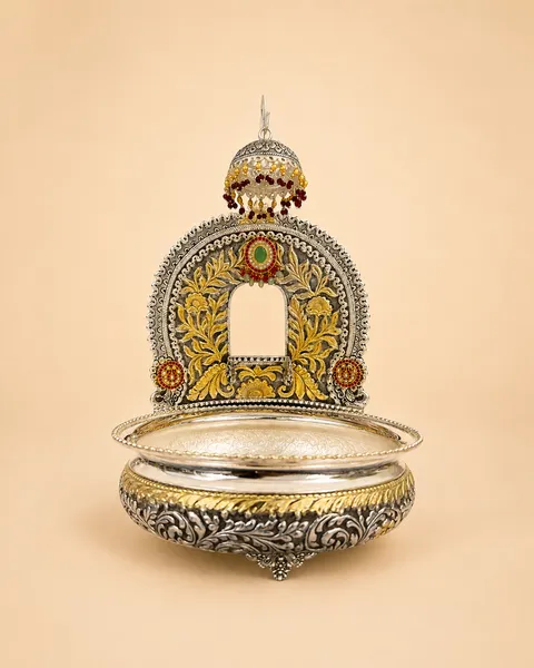 Sterling silver jaldhara for abhishek with gold foliage and stone accents, handcrafted in Jaipur.