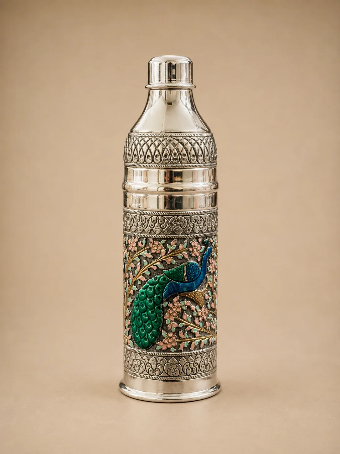 Sterling silver water bottle with a peacock in a soft pastel floral garden, handcrafted in Jaipur.