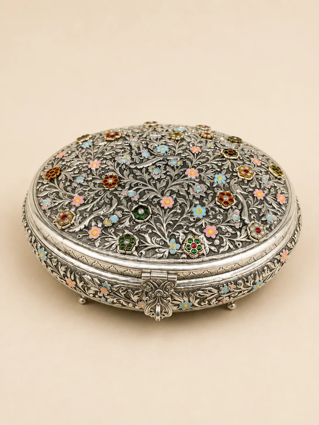 Round sterling silver dry fruit box with an all-over jewelled flower garden lid, handcrafted in Jaipur.