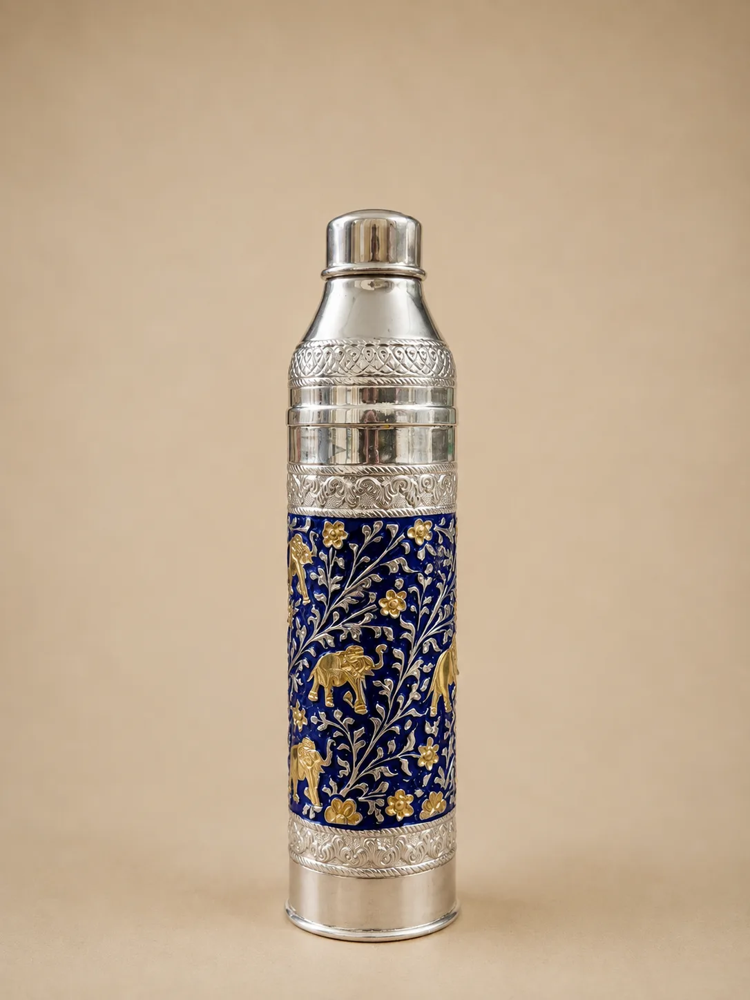 Sterling silver water bottle with gold elephants on a royal blue enamel ground, handcrafted in Jaipur.