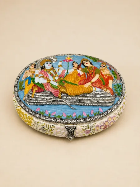 Sterling silver dry fruit box with a meenakari scene of Vishnu on the cosmic ocean, handcrafted in Jaipur.