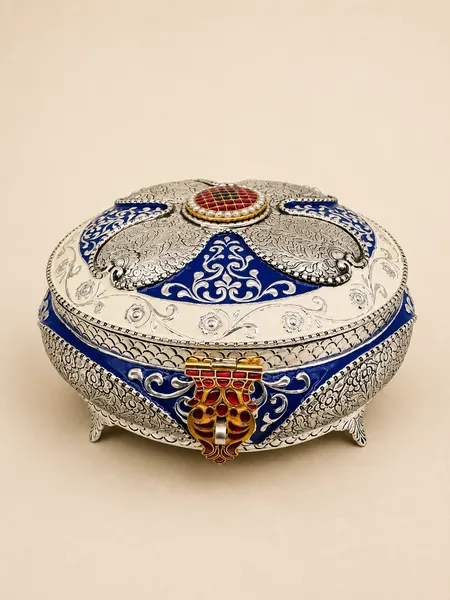 Sterling silver dry fruit box with a cobalt-and-silver radiating lotus lid, handcrafted in Jaipur.