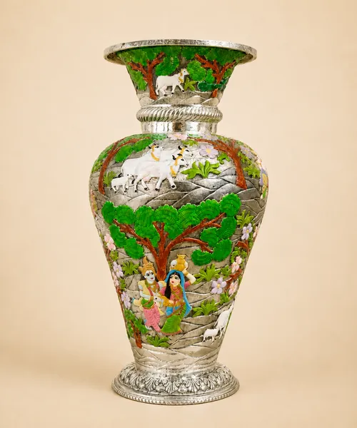 Sterling silver vase with a Vrindavan scene of Radha, Krishna, and cows in green meenakari, handcrafted in Jaipur.