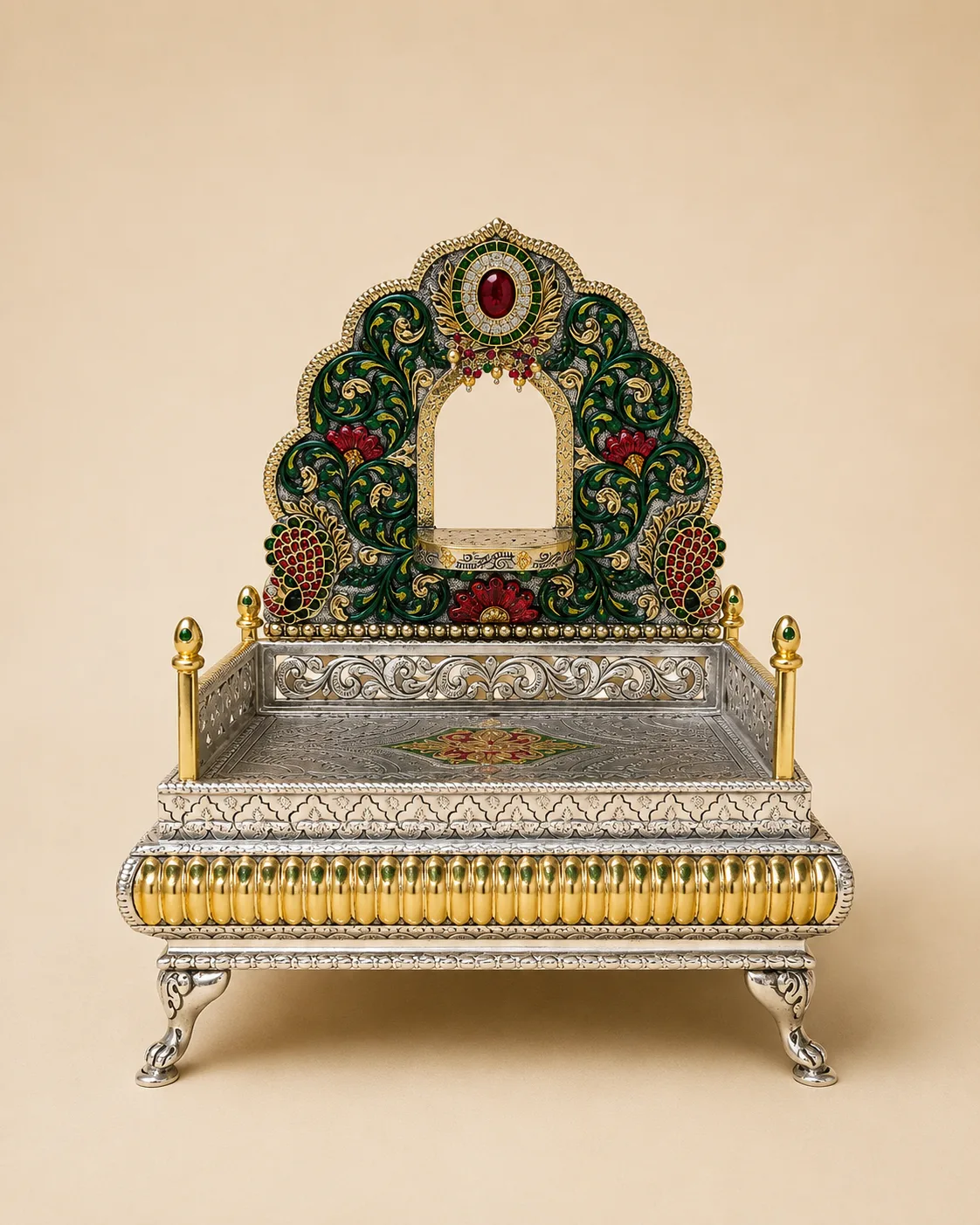 Jewelled sterling silver singhasana with a ruby cabochon and emerald meenakari foliage, handcrafted in Jaipur.