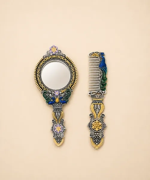 Sterling silver mirror-and-comb set with peacock meenakari and gold handles, handcrafted in Jaipur.