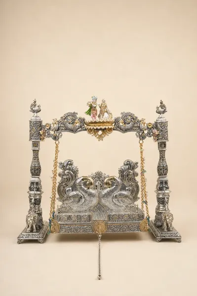 Traditional hand-carved silver temple and pooja items